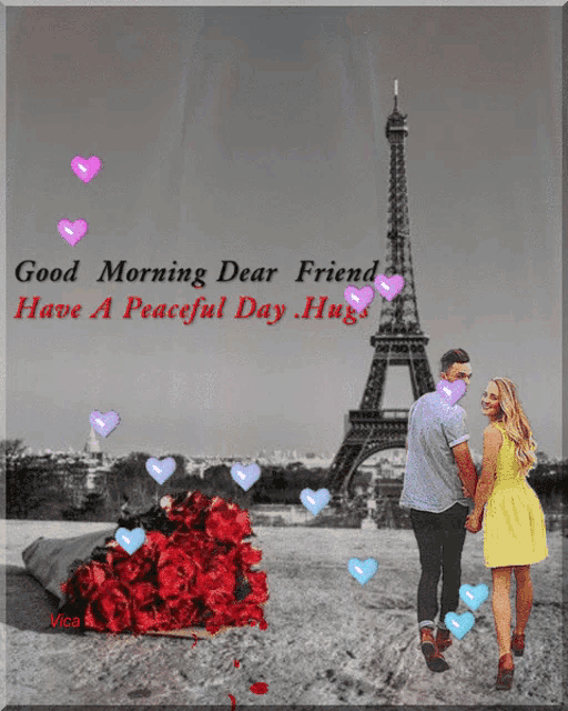 a couple holding hands in front of the eiffel tower
