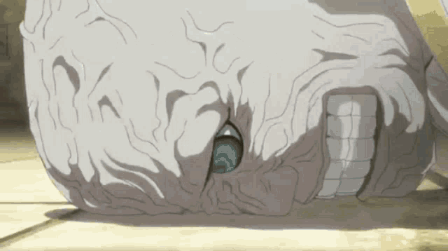 a drawing of a skull with a blue eye and a hole in it