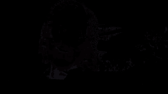 a person is standing in a circle with a drawing on the floor