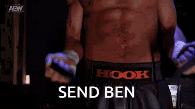 a shirtless man with a tattoo on his back says send ben .