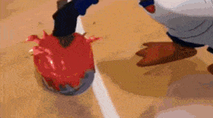 a cartoon duck is kicking a basketball on a basketball court .