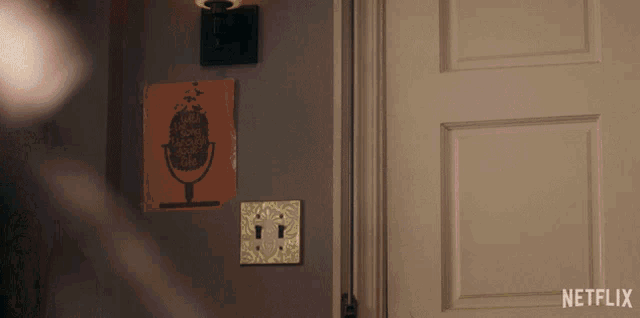 a netflix ad is displayed on a door