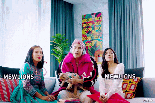 two women and a man are sitting on a couch with mewlions written on the bottom