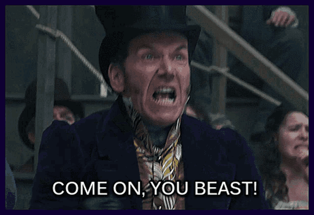 a man in a top hat says come on you beast in front of a crowd