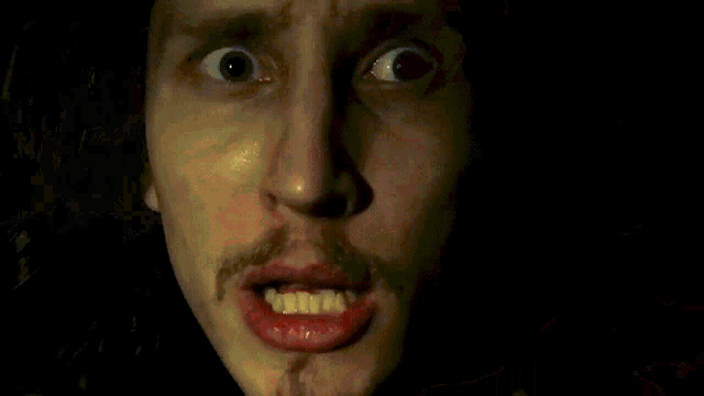 a close up of a person 's face with 45-50 favorim written in white letters