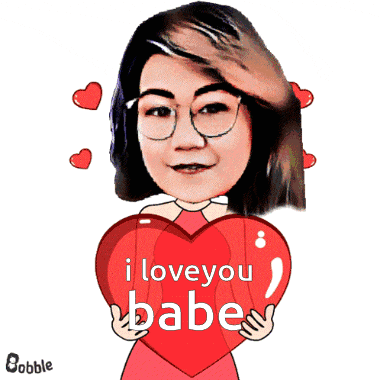 a woman holding a red heart that says i love you babe