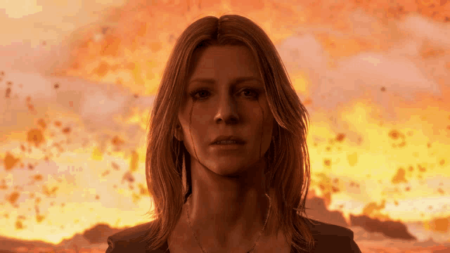 a woman stands in front of a burning sky