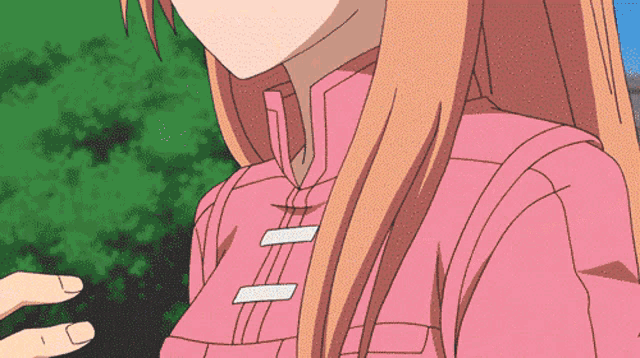 a girl with long brown hair is wearing a pink jacket