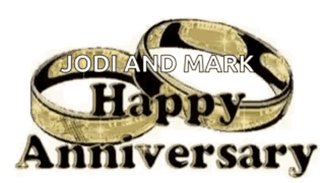 a couple of wedding rings with the words `` jodi and mark happy anniversary '' on them .