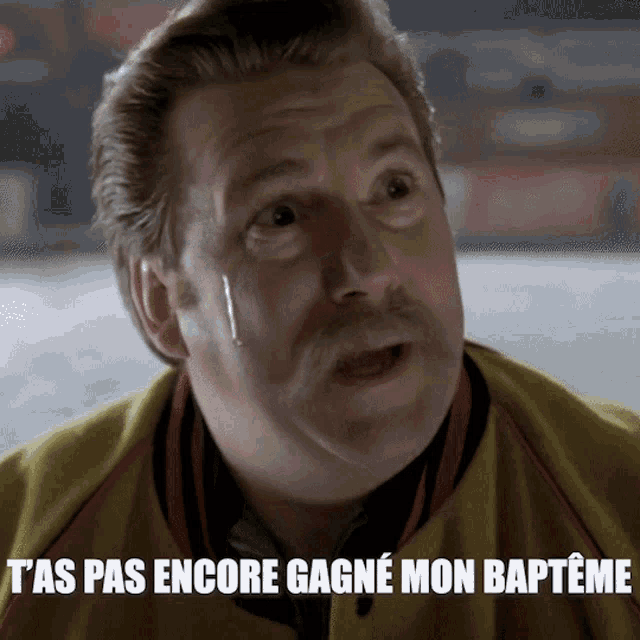 a man with a tear coming out of his eye and the words " t'as pas encore gagne mon bapteme " below him