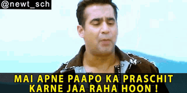 a man is making a funny face with the words mai apne paapo ka prashit karne jaa raha hoon written above him .