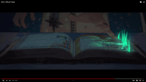 a person in a library with a green infinity symbol behind them