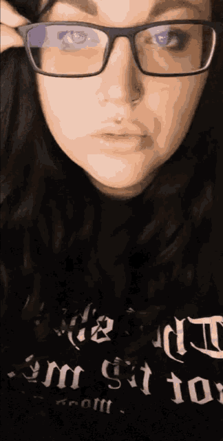 a woman wearing glasses and a shirt that says " i 'm got to " on it