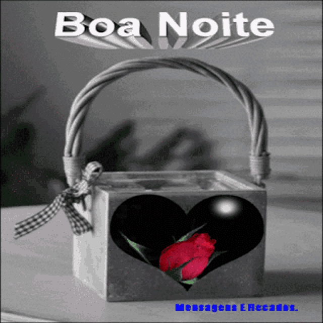 a wicker basket with a heart in it and the words boa noite written above it