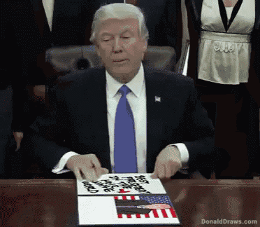 donald trump is sitting at a table signing a document with donalddraws.com written on the bottom