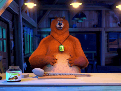 a bear with a jar of yummy jam on the counter