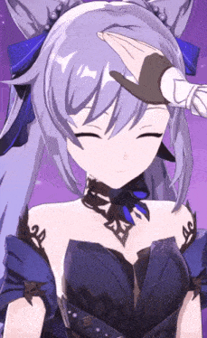 a person 's hand is on a girl 's head with a purple background