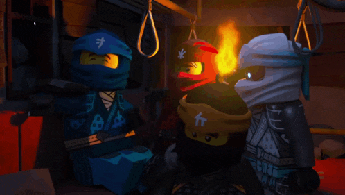 a group of lego ninjago characters are sitting around each other