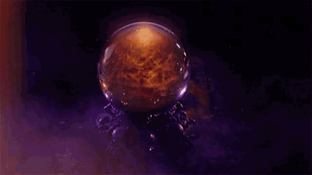 a purple background with a glowing ball in the middle