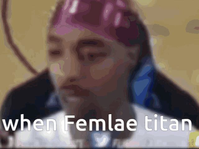 a blurred image of a person with the words " when femlae titan " on it
