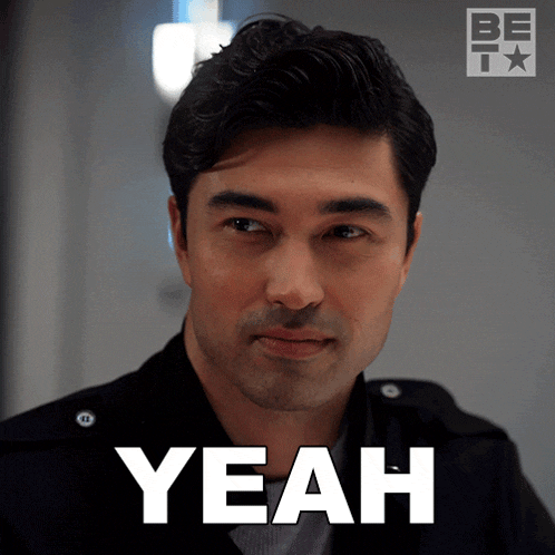 a man in a black jacket says " yeah "
