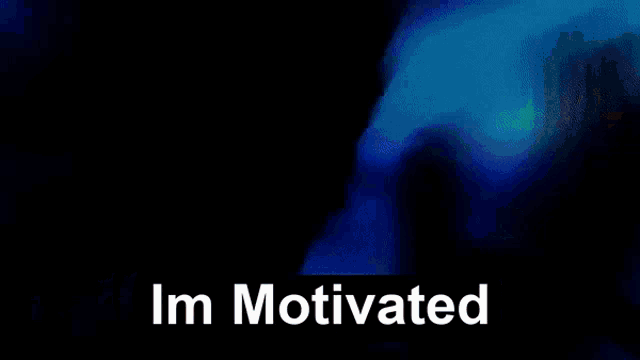 a blurry picture of a man with the words `` i 'm motivated '' written above him .