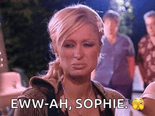 a woman says eww-ah sophie in front of a crowd of people