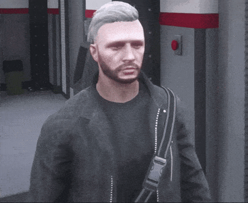 a man with a beard is wearing a black jacket and a black shirt