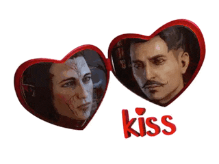 two red heart shaped mirrors with a man and a woman on them