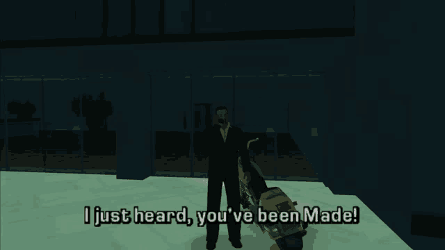 a man standing next to a motorcycle with the words i just heard you 've been made