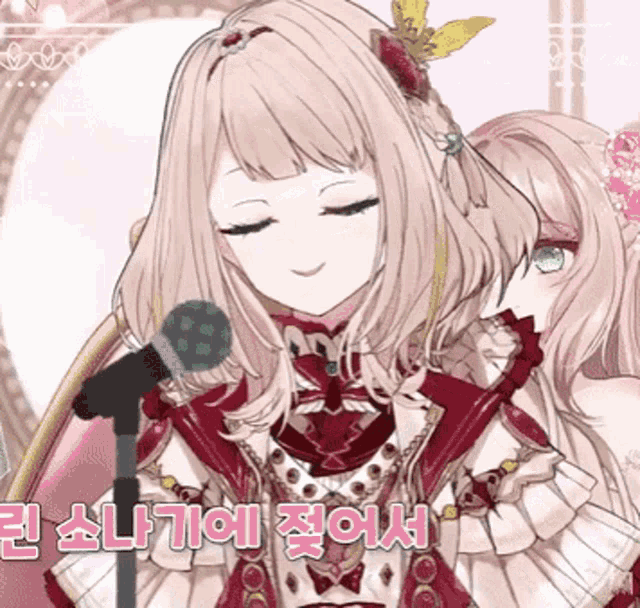 a girl in a red dress is singing into a microphone with korean writing behind her