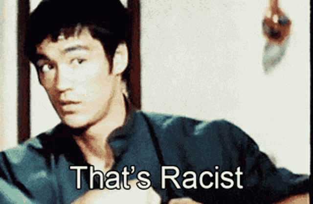 bruce lee says that 's racist in front of a white background