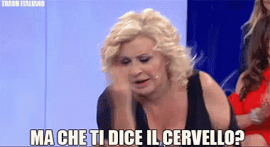 a woman is making a funny face with the words ma che ti dice il cervello written below her