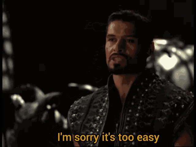 a man with a beard is saying i 'm sorry it 's too easy