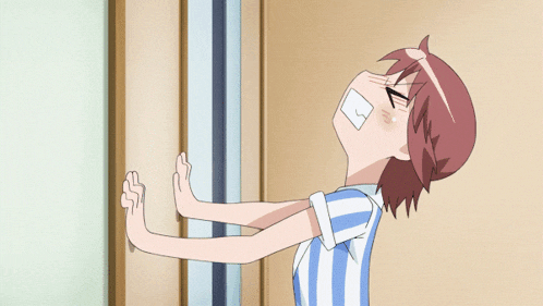 a girl in a blue and white striped shirt is pushing a wall