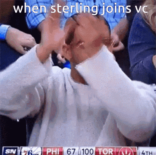 a man covering his face while watching a basketball game with the words when sterling joins vc on the bottom