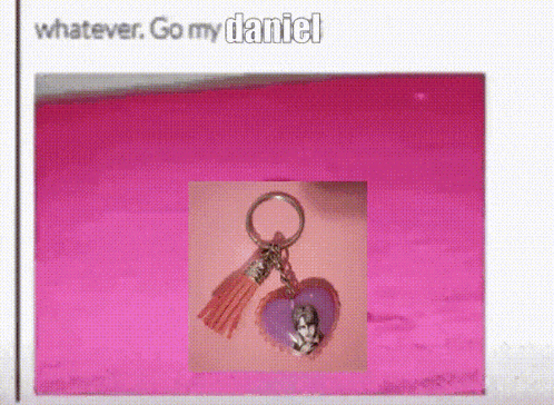 a pink background with a picture of a keychain and the words " whatever go my daniel " on top