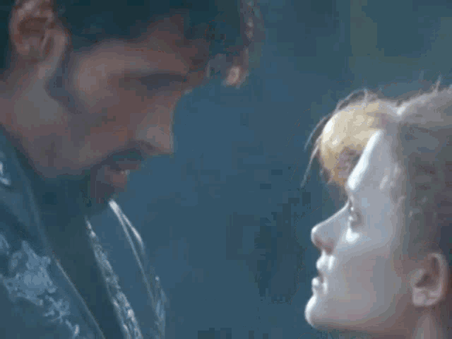 a man and a woman are looking at each other with the words i 'll protect you below them