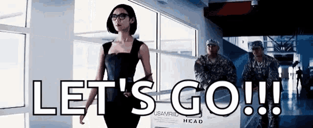 a woman is walking down a hallway with soldiers and the words let 's go !!