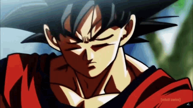 a close up of a cartoon character with his eyes closed and a red and black shirt .