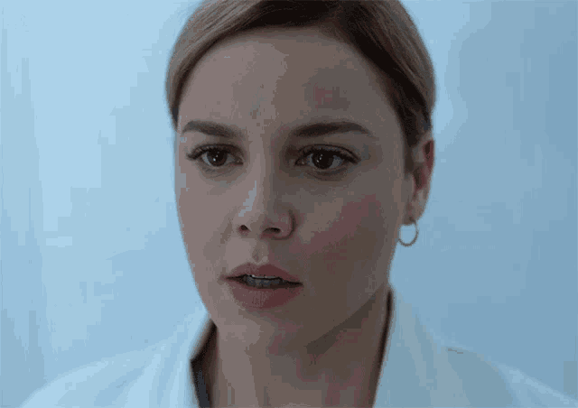 a close up of a woman 's face with the hashtag #jackryan on the bottom