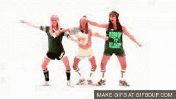 three women are dancing together and one of them is wearing a shirt that says keep it classy