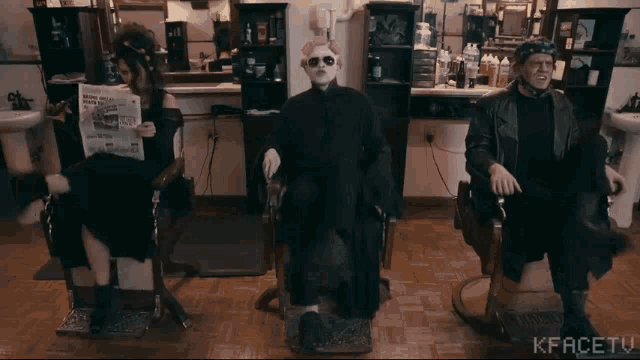 three people are sitting in barber chairs in a barber shop with kfacetv written in the corner