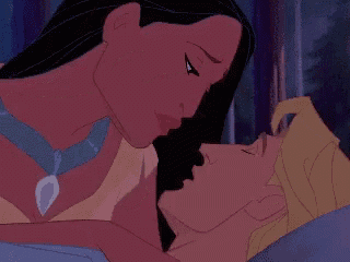 a couple of cartoon characters kissing with one wearing a blue necklace