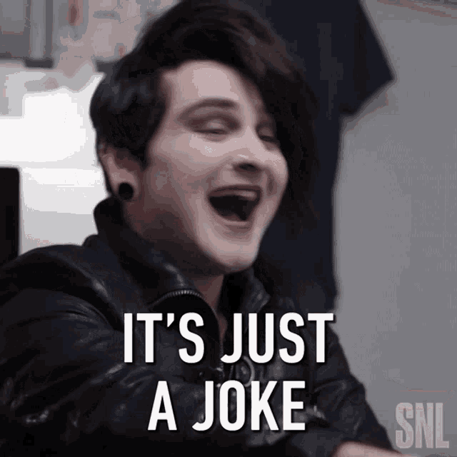 a man is laughing with the words it 's just a joke