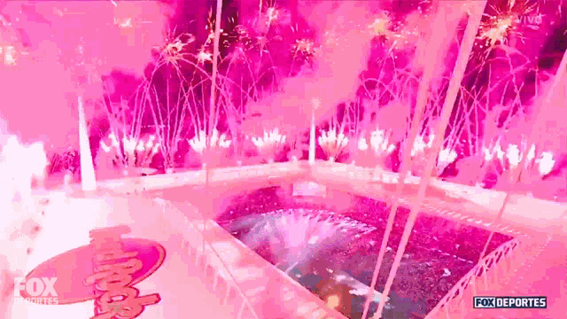 a fox deportes advertisement with a pool and fireworks in the background