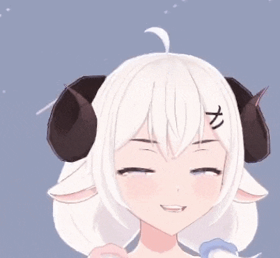 a close up of a girl with horns on her head .