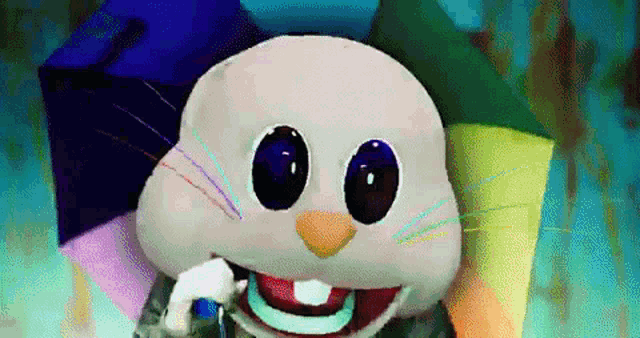 a cartoon rabbit is holding an umbrella in front of a rainbow background