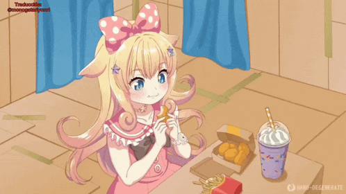 a girl is sitting at a table with a box of chicken nuggets and a drink