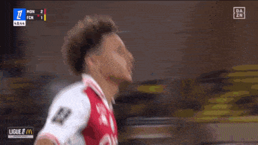a soccer player with a mcdonalds logo on his jersey